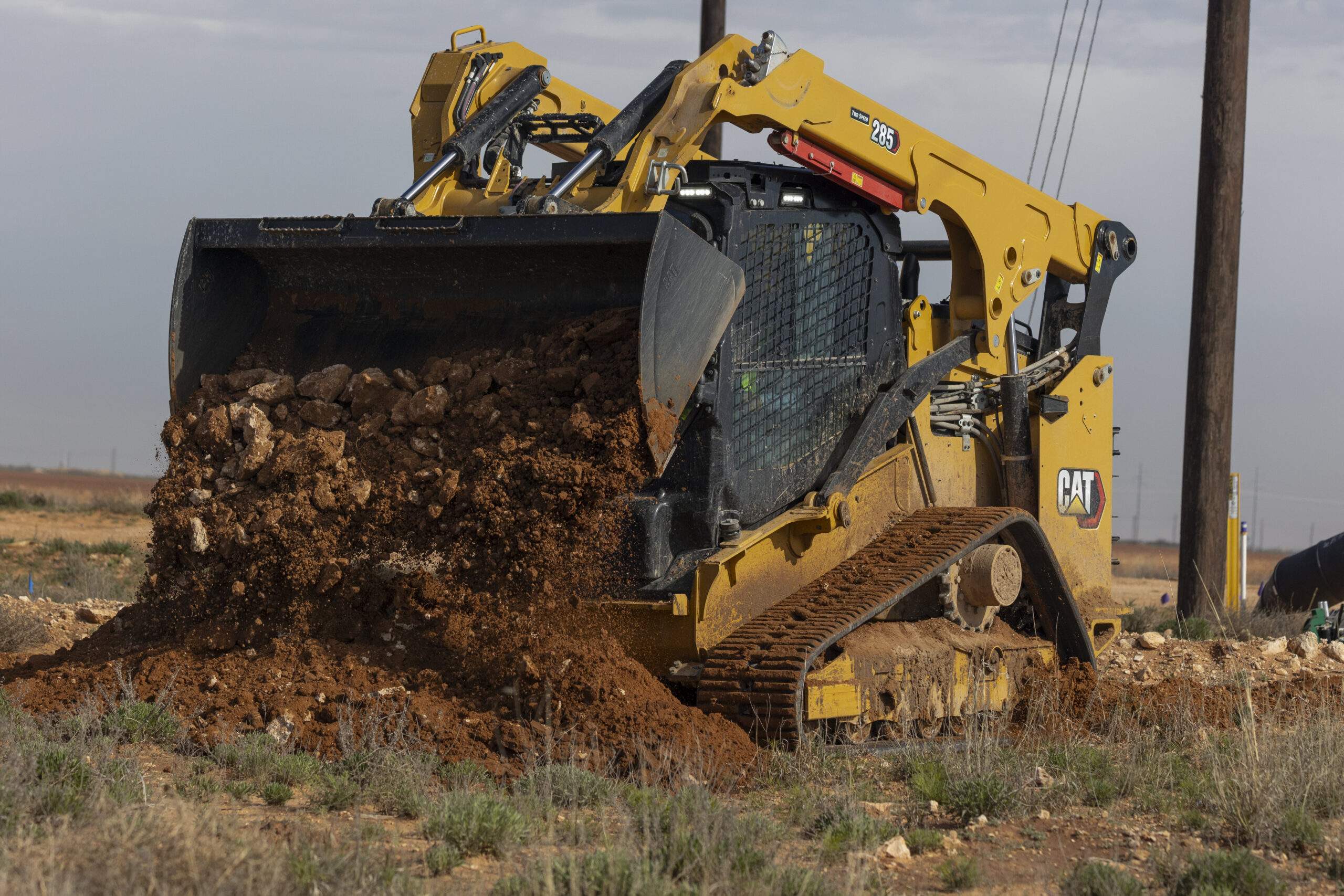 Compact Track Loader moving dirt