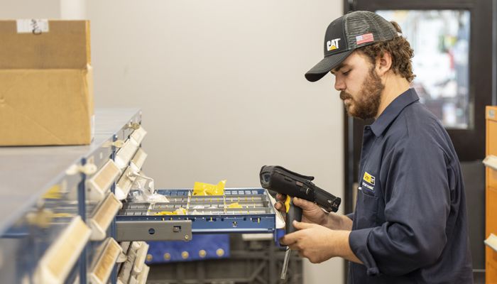 A Carter Cat employee working on processing returns